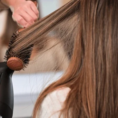 professional-blow-drying-hair-round-600nw-2446423565